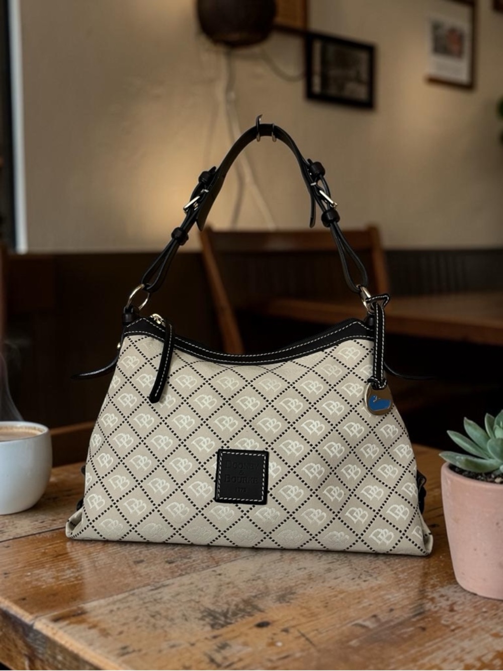 Dooney & Bourke Cream Monogram Shoulder Bag with Blue Duck Hang Tag. - Picture 2 of 14
